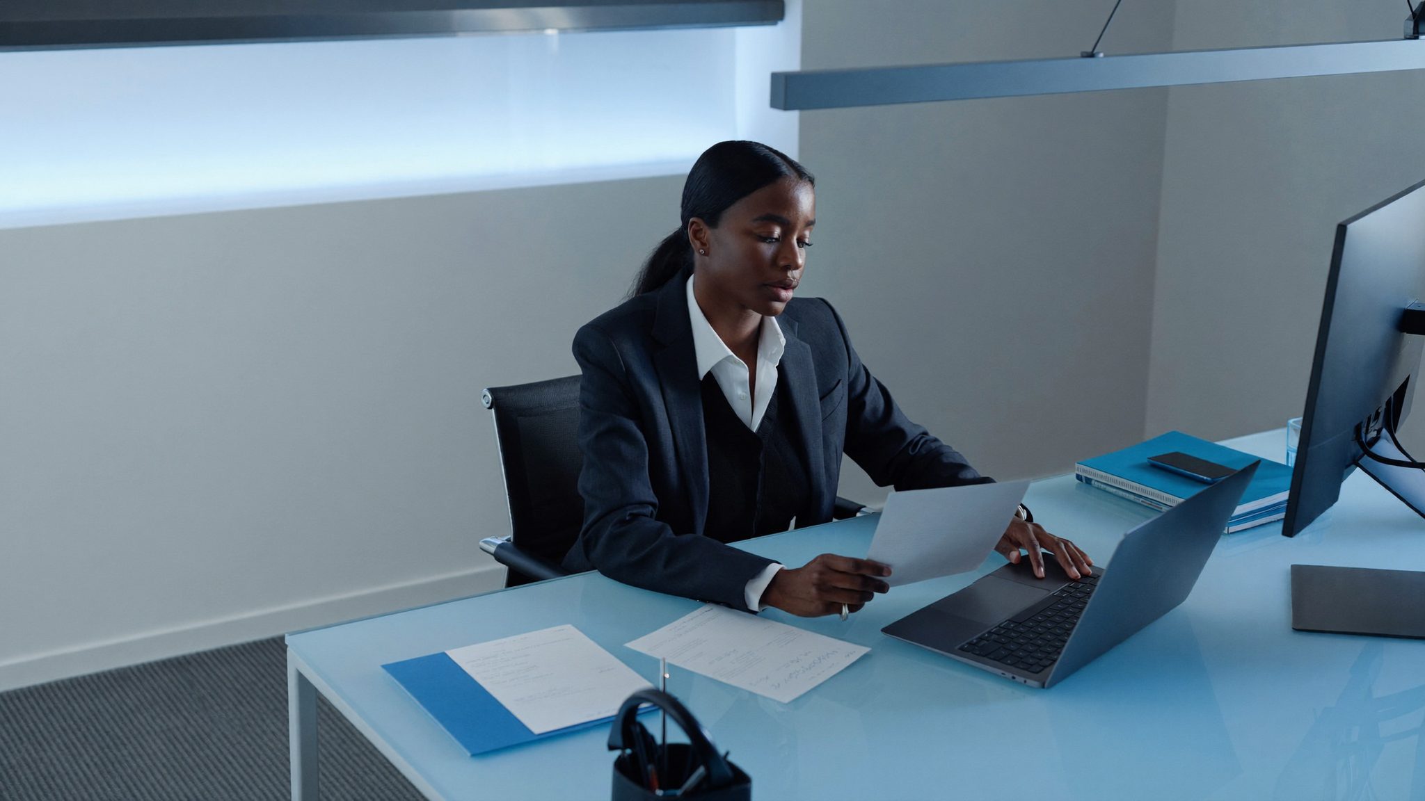 Elmoria financial advisor working at a desk